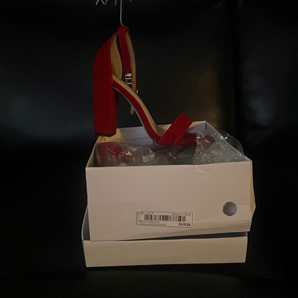 Brand new red size 7 heels. Purchased from Shein.